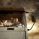 Portrait of truck driver at the sunset