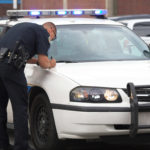bigstock-Policeman-making-report