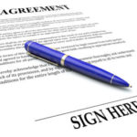 Agreement word on document with pen about to sign a signature to