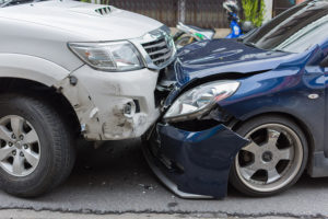 How do I get compensated after getting hit by an out-of-state driver?