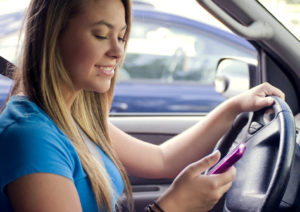 Teen girl texting while driving leads to fatal car accident reports.