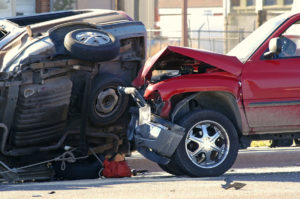 Two crashed cars in auto accident without insurance.