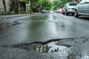 car damage due to poor road conditions