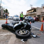Traffic Accident Between A Car And A Motorcycle