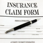 Blank Insurance Claim Form And Pen