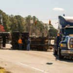 Logging Truck Turned Over On Highway