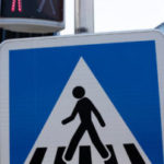 Crosswalk Road Sign. Pedestrian Crossing Sign And Traffic Light