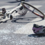 Helmet And Bicycle On Pedestrian Crossing After Traffic Accident