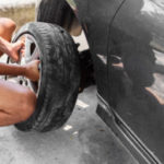 Change A Flat Car Tire At Car Park With Tire Maintenance, Damage