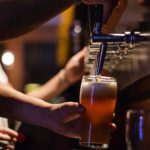 pouring beer from tap