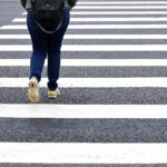 woman in crosswalk