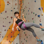 girl in rock climbing gym