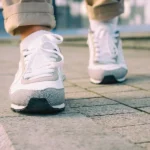 Person-walking-on-pavement-150x150